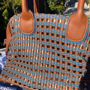 Big Buddha metallic turquoise color woven bag gold brown and blue